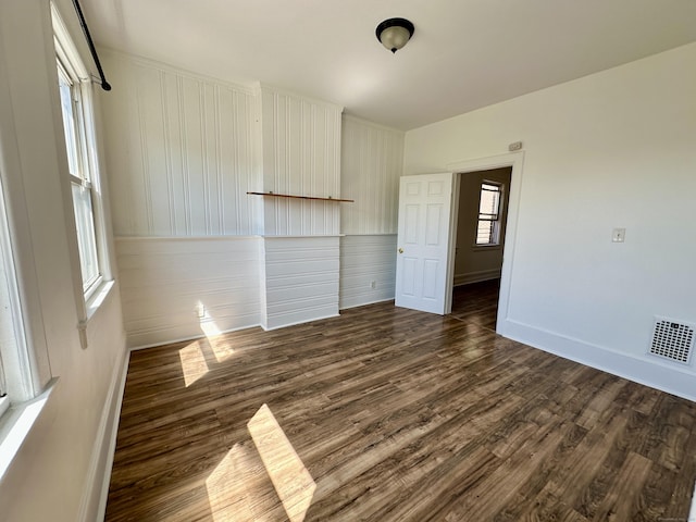 310 Bond St, Bridgeport, CT 06610 - spare room with dark wood finished floors