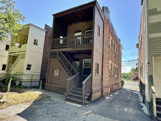 310 Bond St, Bridgeport, CT 06610 - view of front of home with stairway