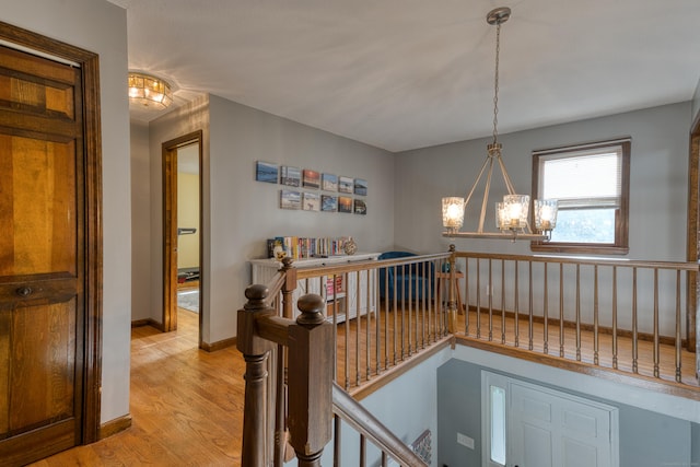 279 Annelise Ave, Southington, CT 06489 - hall with an upstairs landing, a chandelier, and light wood-style floors