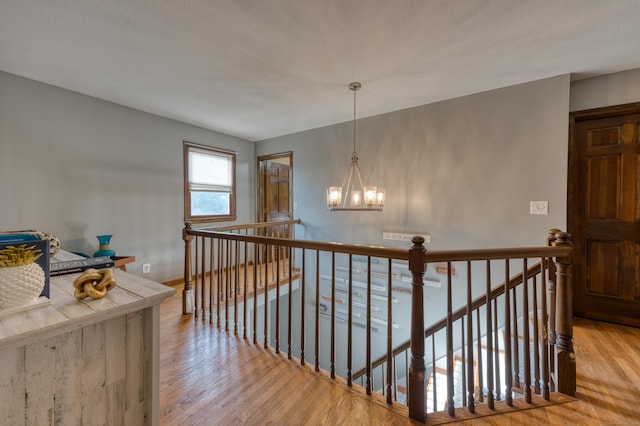 279 Annelise Ave, Southington, CT 06489 - hallway featuring an upstairs landing, a chandelier, and wood finished floors