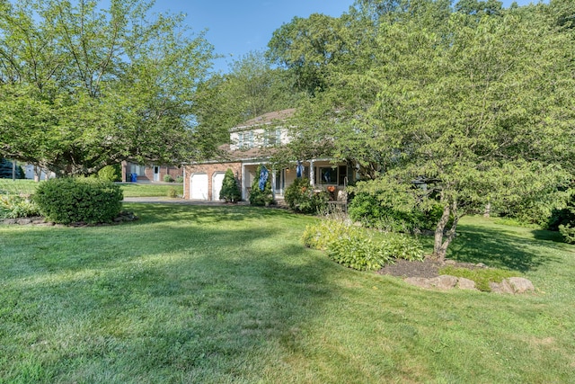 279 Annelise Ave, Southington, CT 06489 - view of grassy yard with a garage