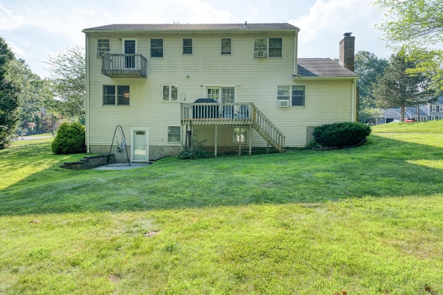 279 Annelise Ave, Southington, CT 06489 - back of house with a chimney, a lawn, a wooden deck, and stairway