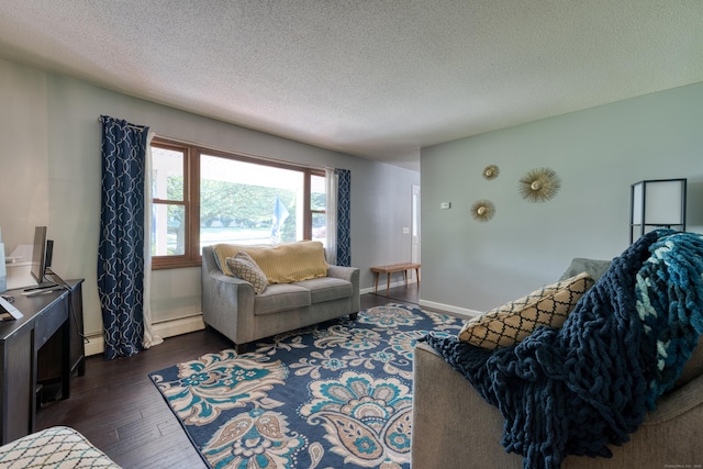 279 Annelise Ave, Southington, CT 06489 - living area featuring dark wood-style floors, a baseboard heating unit, and a textured ceiling