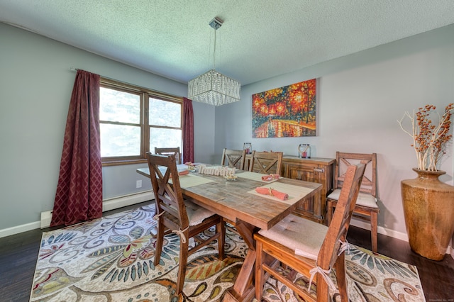 279 Annelise Ave, Southington, CT 06489 - dining room featuring a textured ceiling, a chandelier, a baseboard radiator, and wood finished floors