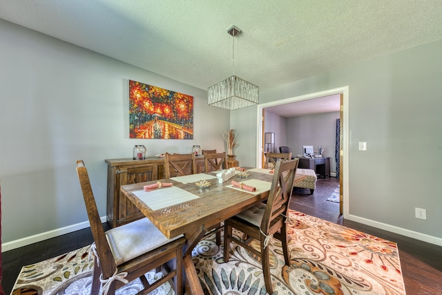 279 Annelise Ave, Southington, CT 06489 - dining room featuring a chandelier, dark wood-style floors, and a textured ceiling