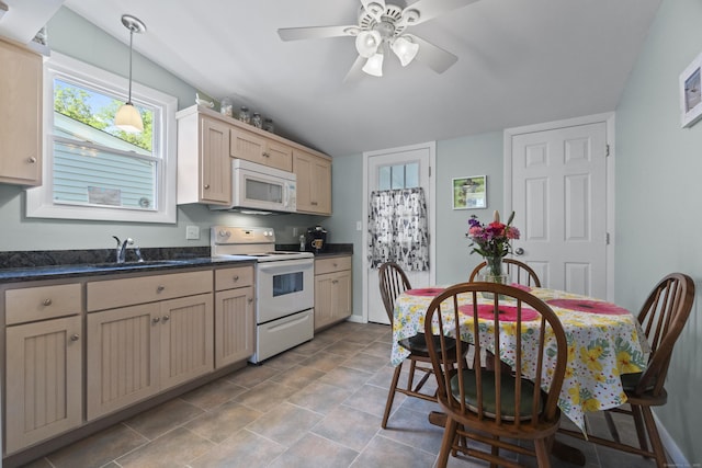 30 Hartford Ave Unit A, Old Lyme, CT 06371 - kitchen featuring white appliances, dark countertops, ceiling fan, lofted ceiling, and pendant lighting