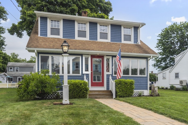 30 New Britain Rd, Old Lyme, CT 06371 - view of front facade with entry steps, a chimney, roof with shingles, and a front yard