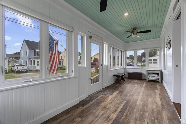 30 New Britain Rd, Old Lyme, CT 06371 - sunroom with wood finished floors, plenty of natural light, wooden ceiling, ornamental molding, and a deck