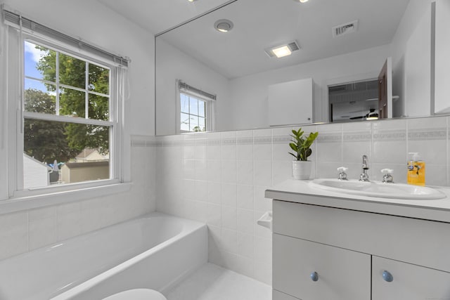 30 New Britain Rd, Old Lyme, CT 06371 - full bath with vanity, a bath, tile walls, and backsplash