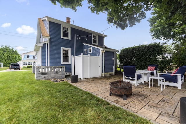 30 New Britain Rd, Old Lyme, CT 06371 - back of property featuring an outdoor fire pit, a yard, a patio, and a chimney