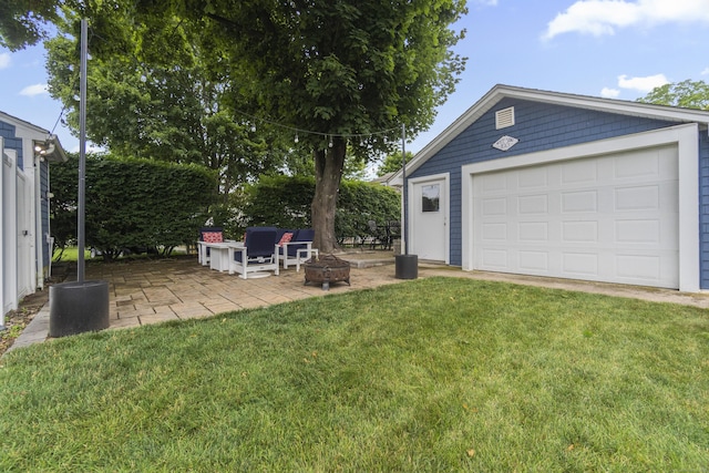 30 New Britain Rd, Old Lyme, CT 06371 - view of grassy yard with a fire pit, an outbuilding, and a detached garage