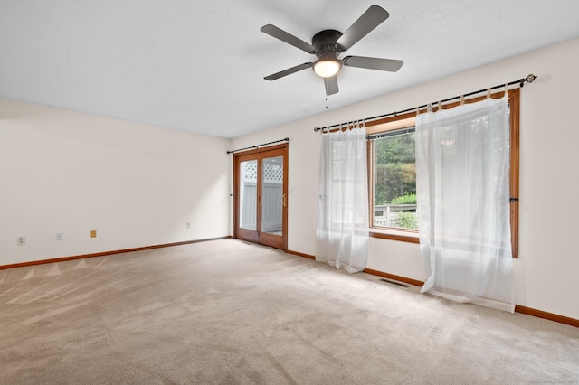 1325 Farmington Ave Apt 11, Bristol, CT 06010 - carpeted spare room featuring baseboards and a ceiling fan