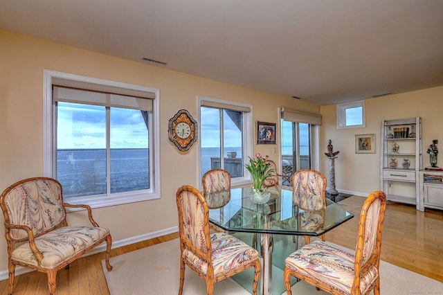 2 Old Town Hwy Unit 45, East Haven, CT 06512 - dining space featuring hardwood / wood-style floors and baseboards