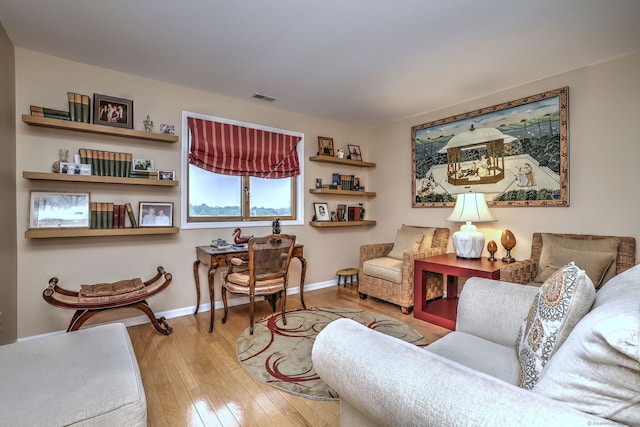 2 Old Town Hwy Unit 45, East Haven, CT 06512 - living area featuring hardwood / wood-style flooring and baseboards