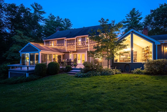 341 W Mountain Rd, Simsbury, CT 06092 - back of property featuring a yard, a chimney, a sunroom, and a balcony