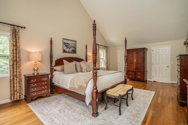 341 W Mountain Rd, Simsbury, CT 06092 - bedroom featuring wood finished floors and vaulted ceiling