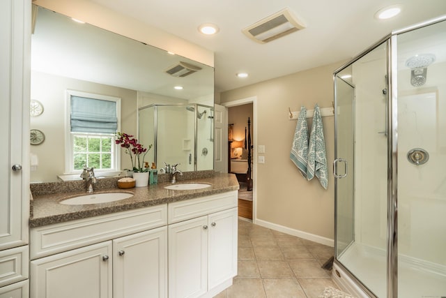 341 W Mountain Rd, Simsbury, CT 06092 - full bathroom with a shower stall, tile patterned flooring, double vanity, and recessed lighting