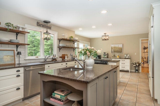 341 W Mountain Rd, Simsbury, CT 06092 - kitchen featuring open shelves, dishwasher, decorative backsplash, a kitchen island with sink, and recessed lighting