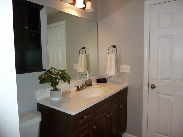 83 Nutmeg Dr, Torrington, CT 06790 - bathroom with vanity and toilet