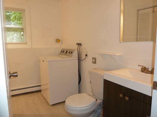 83 Nutmeg Dr, Torrington, CT 06790 - half bathroom featuring washer / clothes dryer, a baseboard radiator, and vanity