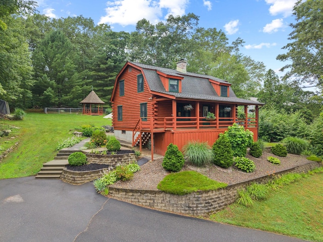 40 Devonshire Dr, Waterford, CT 06385 - log home featuring stairway, a front yard, log exterior, a chimney, and a gazebo