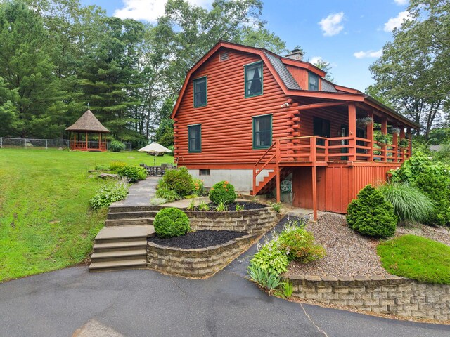 40 Devonshire Dr, Waterford, CT 06385 - view of front of house with a gazebo, stairway, log exterior, and a chimney