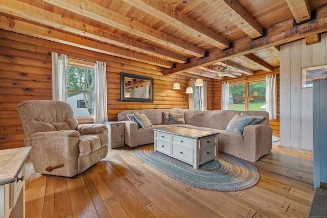 40 Devonshire Dr, Waterford, CT 06385 - living area featuring light wood-type flooring, a wood ceiling with exposed beams, rustic walls, and ceiling fan