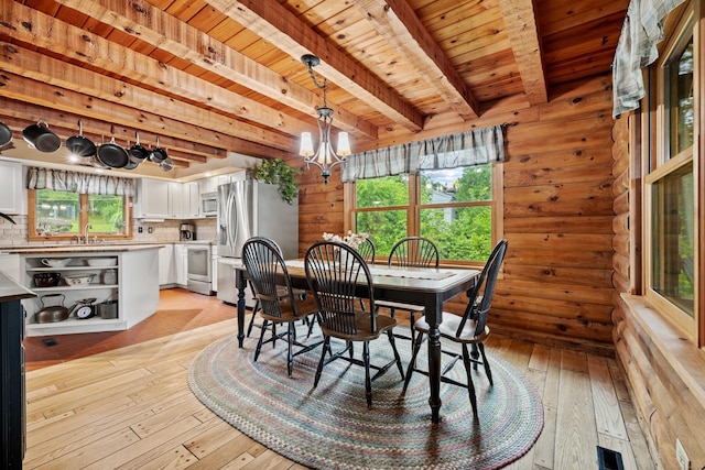 40 Devonshire Dr, Waterford, CT 06385 - dining area with a chandelier, light wood finished floors, and a wooden ceiling with exposed beams
