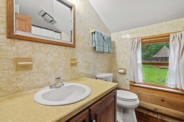 40 Devonshire Dr, Waterford, CT 06385 - bathroom featuring vanity, vaulted ceiling, tile walls, backsplash, and curtained shower