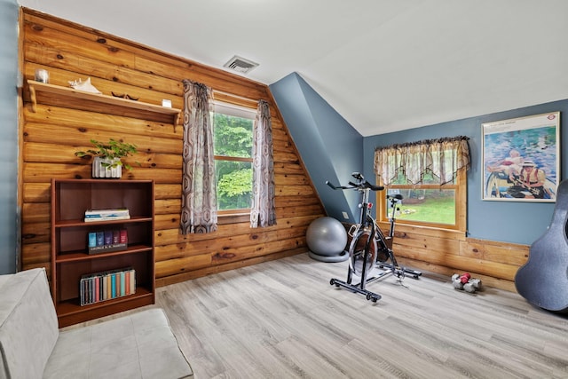 40 Devonshire Dr, Waterford, CT 06385 - workout room featuring vaulted ceiling, wood finished floors, and log walls