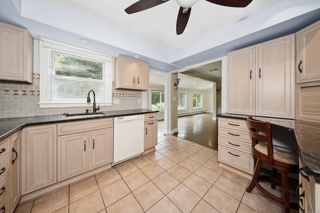 5338 Main St, Trumbull, CT 06611 - kitchen featuring dishwasher, a ceiling fan, light tile patterned floors, tasteful backsplash, and healthy amount of natural light