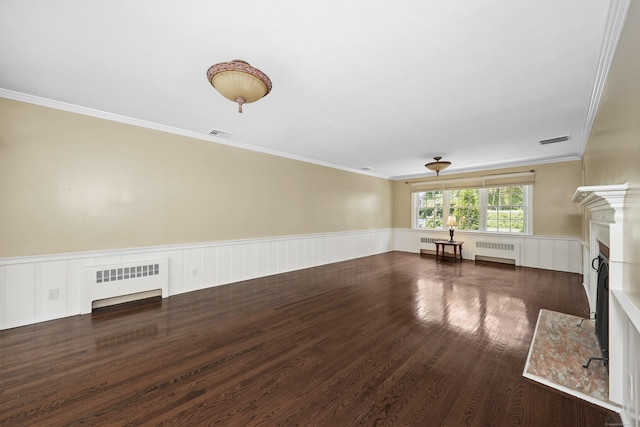 5338 Main St, Trumbull, CT 06611 - unfurnished living room featuring radiator heating unit, crown molding, wood finished floors, a fireplace, and wainscoting
