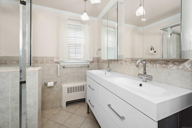5338 Main St, Trumbull, CT 06611 - full bathroom with radiator, double vanity, tile patterned flooring, tile walls, and a shower stall