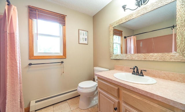 53 Princeton Dr, Middletown, CT 06457 - full bathroom with a baseboard radiator, vanity, and tile patterned floors