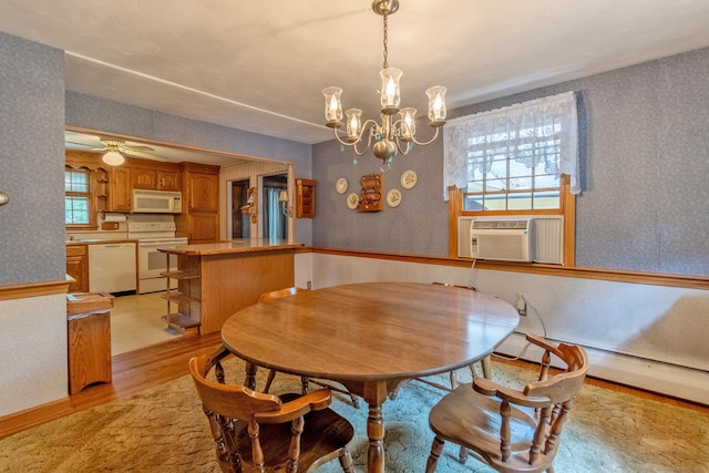 841 S Curtis St, Meriden, CT 06450 - dining space with cooling unit, wallpapered walls, light wood-style flooring, a chandelier, and a ceiling fan