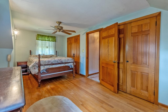 841 S Curtis St, Meriden, CT 06450 - bedroom featuring light wood-style flooring, two closets, and a ceiling fan