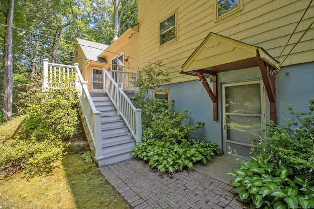 841 S Curtis St, Meriden, CT 06450 - view of exterior entry featuring stucco siding
