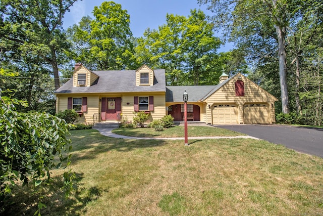 841 S Curtis St, Meriden, CT 06450 - cape cod house with a garage, driveway, a front lawn, and a chimney