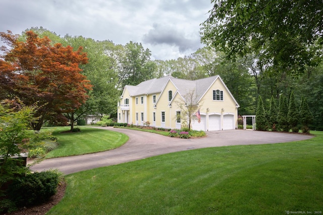 20 Portage Xing, Farmington, CT 06032 - colonial home featuring driveway, an attached garage, and a front yard