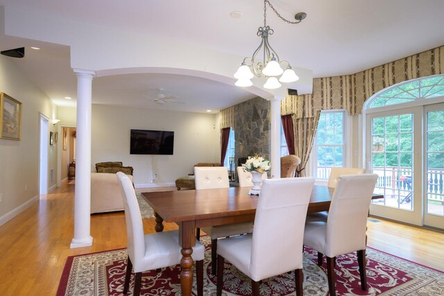 20 Portage Xing, Farmington, CT 06032 - dining area featuring decorative columns, light wood-style floors, a chandelier, a ceiling fan, and recessed lighting