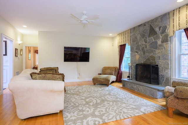 20 Portage Xing, Farmington, CT 06032 - living area featuring wood finished floors, ceiling fan, a fireplace, and recessed lighting