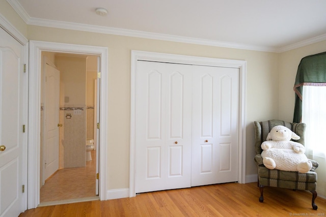 20 Portage Xing, Farmington, CT 06032 - bedroom with light wood-type flooring, crown molding, and a closet