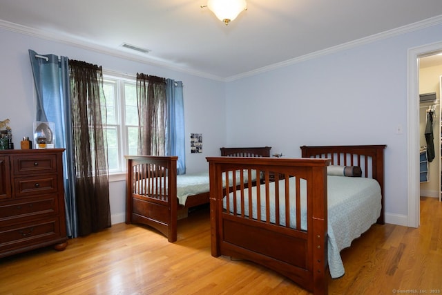 20 Portage Xing, Farmington, CT 06032 - bedroom featuring light wood finished floors and crown molding