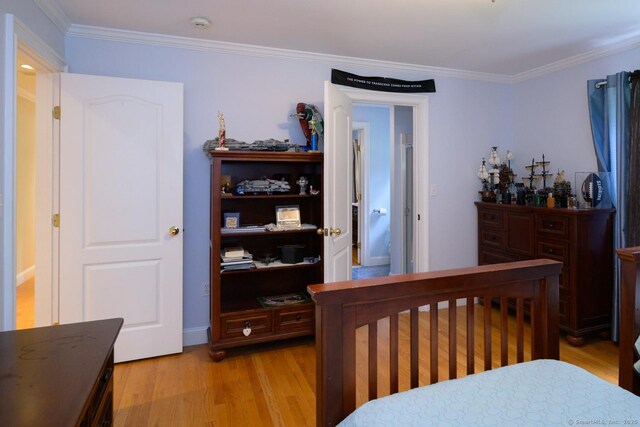 20 Portage Xing, Farmington, CT 06032 - bedroom featuring light wood finished floors and crown molding