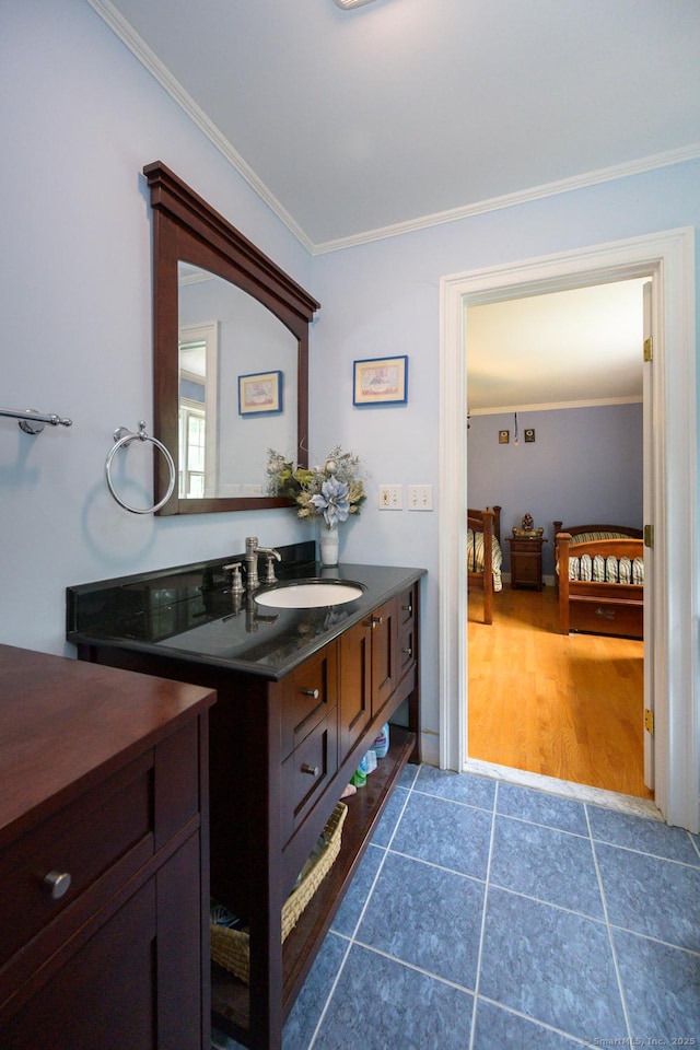 20 Portage Xing, Farmington, CT 06032 - bathroom featuring ornamental molding, vanity, and tile patterned flooring