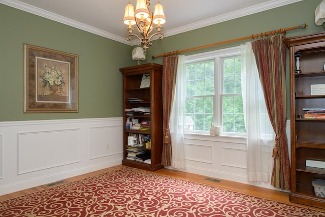 20 Portage Xing, Farmington, CT 06032 - dining room featuring a chandelier, light wood finished floors, ornamental molding, wainscoting, and a decorative wall