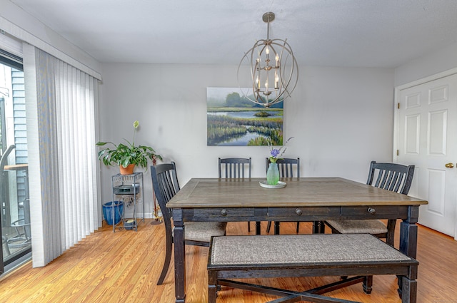 708 Lake Vista Dr Unit 708, East Hampton, CT 06424 - dining area featuring a chandelier and light wood finished floors