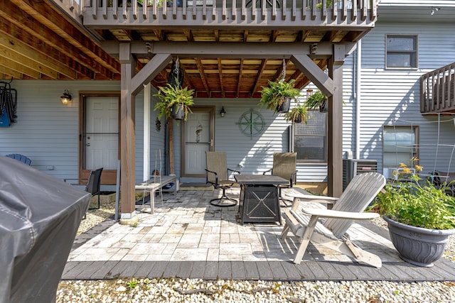 708 Lake Vista Dr Unit 708, East Hampton, CT 06424 - view of patio / terrace featuring an outdoor fire pit
