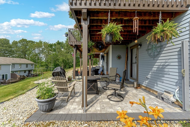 708 Lake Vista Dr Unit 708, East Hampton, CT 06424 - view of patio / terrace with an outdoor fire pit