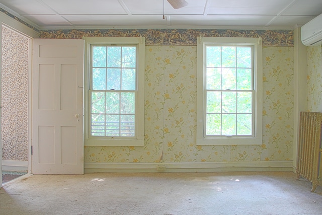 940 Saybrook Rd, Haddam, CT 06438 - carpeted empty room with a wall mounted AC and healthy amount of natural light